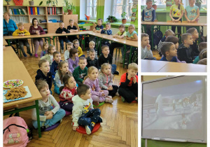 dzieci siedzą w sali lekcyjnej na podłodze i oglądają prezentację multimedialną o zimie