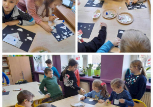 dzieci pracują przy stolikach, naklejają na czarny karton elementy wycięte z gazet, tworząc zimowy obrazek