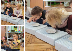 dzieci siedzą po turecku przed miską z makaronem i bez pomocy rąk, próbują wciągnąć ustami makaron
