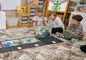 Dziewczynka z ilustracją bajki