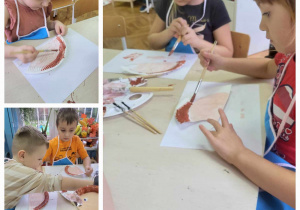 dzieci malują talerz papierowy brązową farba