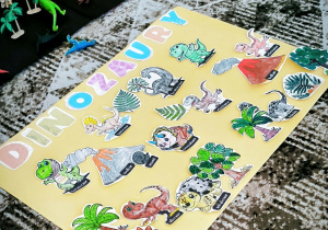 Plakat z dinozaurami